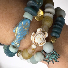 Load image into Gallery viewer, Sea Turtle Bracelet Amber-Made with Recycled Beads
